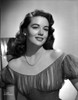 Dorothy Malone on a Lace Dress posed and smiling Photo Print - Item # VARCEL701709