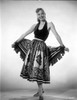 Adele Mara on a Printed Skirt posed and smiling Photo Print - Item # VARCEL701767