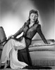 Margo sitting and Looking Down Pose Photo Print - Item # VARCEL701789
