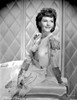 Mary Martin on an Embroidered Dress smiling and sitting Photo Print - Item # VARCEL701897