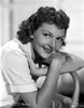 Mary Martin Leaning and smiling on a Chair Photo Print - Item # VARCEL701948