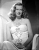 Osa Massen sitting and Slightly smiling Portrait Photo Print - Item # VARCEL701988