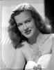 Osa Massen sitting and smiling Portrait Photo Print - Item # VARCEL701978
