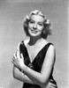 Gertrude Michael on a V-Neck Dress and smiling Photo Print - Item # VARCEL702121