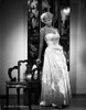 Beverly Michaels on a Printed Tube Dress and standing Portrait Photo Print - Item # VARCEL702109