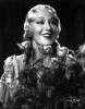 Grace Moore on an Embroidered with Roses and smiling Portrait Photo Print - Item # VARCEL702295