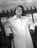 Terry Moore on a Coat Looking Up and smiling Photo Print - Item # VARCEL702335