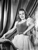 Terry Moore on a Puff Sleeve and smiling Portrait Photo Print - Item # VARCEL702340