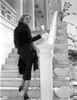 Patricia Neal on a Long Sleeve standing on Stairs Photo Print - Item # VARCEL702533