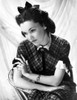 Maureen O'Sullivan on a Checkered Dress sitting Photo Print - Item # VARCEL702715