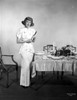 Eleanor Parker on a Printed Top and Holding a Knife Photo Print - Item # VARCEL702974