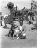 Douglas Fairbanks Jr with a dog on a film set Photo Print - Item # VARCEL688957
