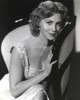 Rhonda Fleming sitting and Leaning on a Chair Photo Print - Item # VARCEL689148