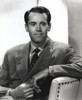 Henry Fonda sitting and Leaning on a Chair Pose Photo Print - Item # VARCEL689266