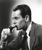 Henry Fonda in a Suit and Tie on a Couch Photo Print - Item # VARCEL689271