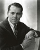 Henry Fonda sitting and Leaning on a Chair in Suit and Tie Photo Print - Item # VARCEL689302