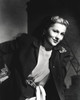 Joan Fontaine Leaning with One Hand, wearing a Black Coat in Portrait Photo Print - Item # VARCEL689350