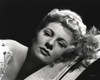 Joan Fontaine Lying on a Couch in a Close Up Portrait Photo Print - Item # VARCEL689378