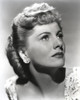 Joan Fontaine Looking Up and wearing an Earrings in a Portrait Photo Print - Item # VARCEL689402