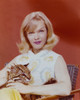 Anne Francis sitting with Baby Leopard Red Background Portrait Photo Print - Item # VARCEL689500