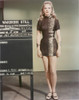 Anne Francis standing in Sexy Black Dress Photo Print - Item # VARCEL689498
