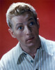 Danny Kaye Close Up Portrait wearing Stripe Polo Shirt in Red Background Photo Print - Item # VARCEL689564