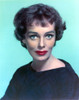 Phyllis Kirk wearing Black Sweater with Red Lips Portrait with Lightblue Background Photo Print - Item # VARCEL689693