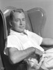 Alan Ladd sitting on a Chair in Close Up Portrait Photo Print - Item # VARCEL689810