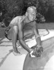 Alan Ladd Playing with a Dog in the Pool in Black and White Portrait Photo Print - Item # VARCEL689818