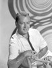 Alan Ladd sitting and posed on the Chair in Black and White Portrait Photo Print - Item # VARCEL689821