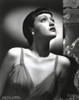 Dorothy Lamour posing outdoors in a bathing suit Photo Print - Item # VARCEL689897
