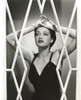 Dorothy Lamour wearing a bathing suit behind a screen Photo Print - Item # VARCEL689926