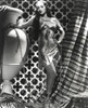 Dorothy Lamour in chains posing with an urn Photo Print - Item # VARCEL689941