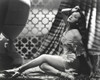 Dorothy Lamour in chains posing with an urn Photo Print - Item # VARCEL689942