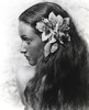 Dorothy Lamour with a flower behind her hear Photo Print - Item # VARCEL689934