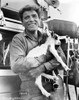 Burt Lancaster in Long Sleeve Polo Carrying an Animal Photo Print - Item # VARCEL690015
