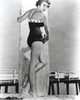 Janet Leigh wearing a bathing suit and holding a surfboard Photo Print - Item # VARCEL690194