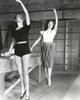 Janet Leigh Posed in Black One Piece Short Sleeve Sexy Unitard and Waist Belt with Left Hand Raised Up Photo Print - Item # VARCEL690233