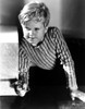 A Jackie Cooper wearing a striped shirt and holding a pistol Photo Print