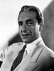 Paul Henried Posed in White Tuxedo Photo Print - Item # VARCEL691999