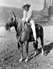 Howard Keel Riding Horse in White Outfit Photo Print - Item # VARCEL692238