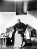 Charles Laughton sitting on a Couch Photo Print - Item # VARCEL692330
