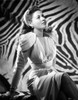 Ramsey Ames Seated with Legs Crossed in White Formal Dress in Black and White Portrait Photo Print - Item # VARCEL692803