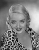 Bette Davis Portrait in Black Floral Printed White V-Neck Long Sleeve Dress with Hands on the Ears Photo Print - Item # VARCEL692924