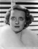 Bette Davis Portrait in White Fur Pelt Coat Looking Up Photo Print - Item # VARCEL692940