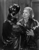 Greta Garbo and a Man wearing Shiny Black Outfit Photo Print - Item # VARCEL693116