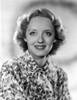 Bette Davis Portrait smiling in Floral White Dress and Neckerchief Photo Print - Item # VARCEL693110