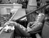 Jean Arthur on a Stripe Top sitting on a Chair Photo Print - Item # VARCEL693182