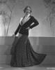 Bette Davis Posed with Hand on the Waist in Black Polka Dot Long Sleeve Dress with White Collar Photo Print - Item # VARCEL693200