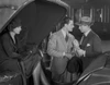 Greta Garbo with Two Man Talking Movie Scene Photo Print - Item # VARCEL693198